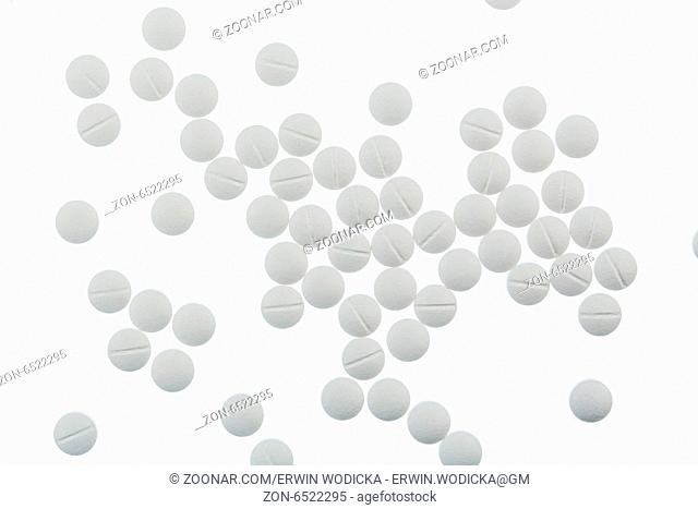Weiße Tabletten, Symbolfoto für Medizin, Heilmittel und Tablettensucht