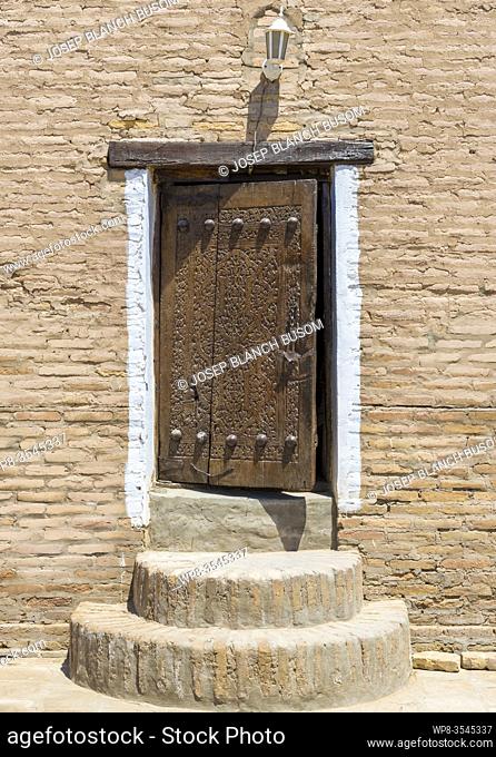Old door in the historic adobe town of Khiva, Chiva, Ichan Kala, Silk Road, Unesco World Heritage Site, Uzbekistan, Central Asia