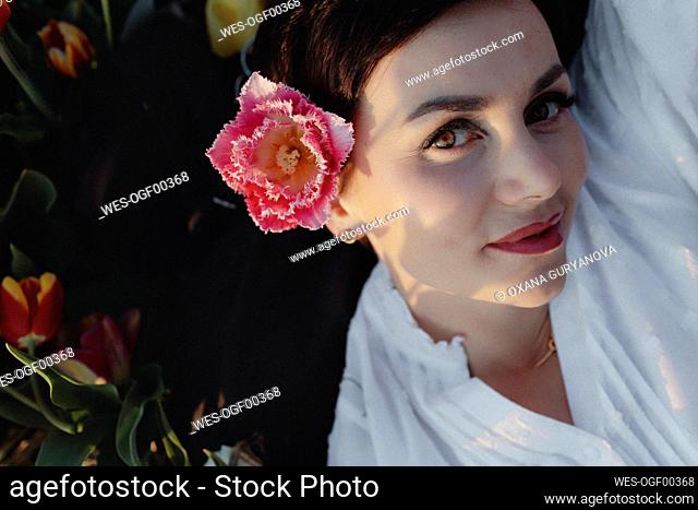 Portrait of woman wearing fringed tulip