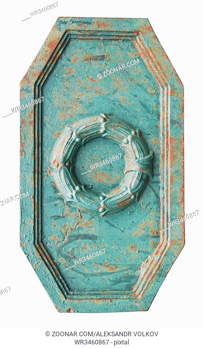 Octagonal rusty green metal decoration in the form of a shield. Isolated on white with patch outdoor vintage object