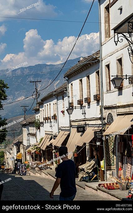 Gjirokaster, Albania Tourists on the mian street of the Old Bazaar or Old Town