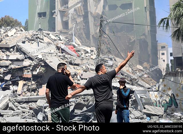 People search for victims of an Israeli airstrike in Gaza City, Gaza Strip