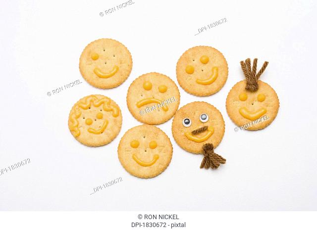 Happy and sad faced crackers