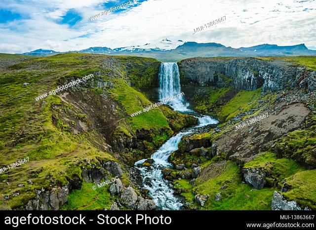 Aerial view of Svodufoss Waterfall and mount Snaefell. Landscape on peninsula Snaefellsnes in western Iceland