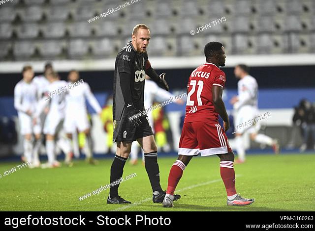 Standard's goalkeeper Arnaud Bodart and Standard's Collins Fai react during a soccer match between OHL Oud-Heverlee-Leuven and Standard de Liege