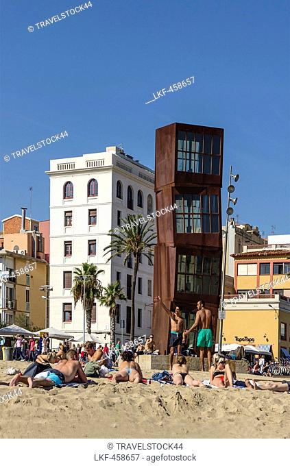 Girls sunbathing on Barceloneta beach, Sculpture by Rebecca Horn, Barcelona, Spain