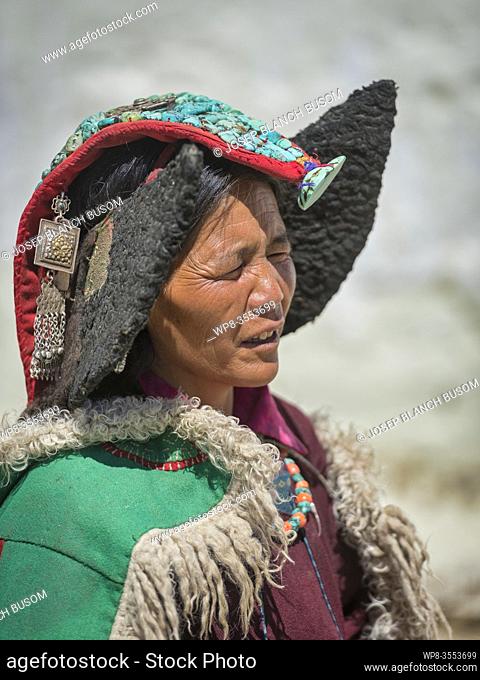 Changpa Nomad woman with turquoise headdress at the Korzok Gustor, Korzok Gompa, Lake Tsomoriri, (Ladakh) Jammu & Kashmir, India