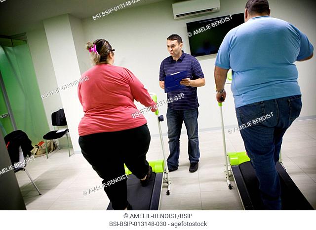 Reportage in the Obesity Clinic IPCO in Mulhouse, France. Physical exercise session with a masseur-physiotherapist. Patients must attend these sessions before...