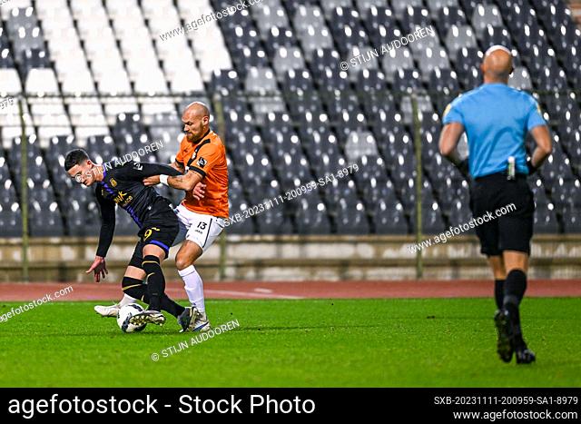 Robbie Ure (69) of RSC Anderlecht and Denis Prychynenko (13) of KMSK Deinze pictured during a soccer game between RSCA Futures and KMSK Deinze during the 12th...