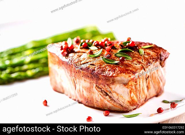 Beef Fillet With Pink Pepper and Asparagus. High quality photo