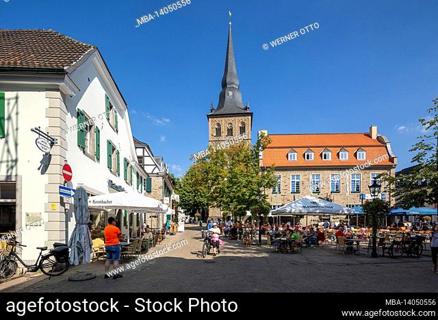 germany, ratingen, bergisches land, rhineland, north rhine-westphalia, market square, people sit in the street restaurant in front of the buergerhaus