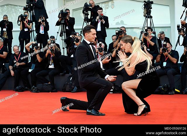 Italian tv carachters Alessandro Basciano and Sophie Codegoni at the 79 Venice International Film Festival 2022. He made marriage proposal to her