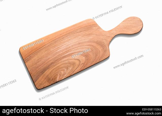New wooden cutting board isolated on a white background