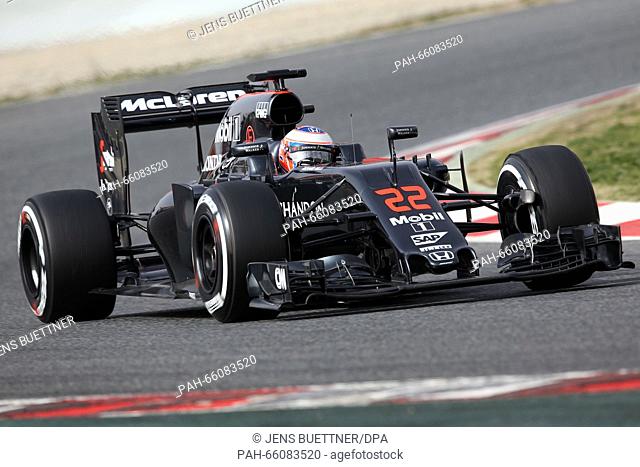 British Formula One driver Jenson Button of McLaren Honda steers the new car MP4-31 during a training session for the upcoming Formula One season at the Circuit...
