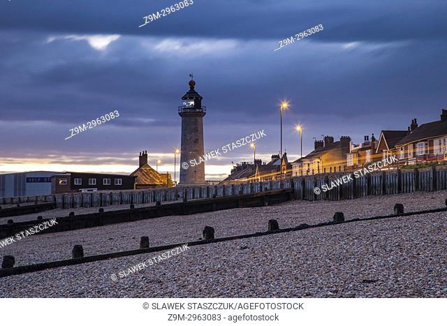 Night falls at Kingston Lighthouse in Shoreham-by-Sea, West Sussex, England