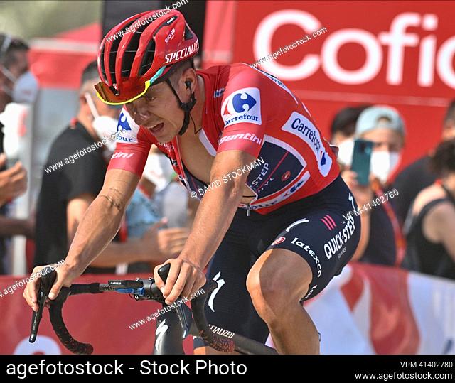 Belgian Remco Evenepoel of Quick-Step Alpha Vinyl wearing the red jersey for leader in the overall ranking pictured in action during stage 9 of the 2022 edition...