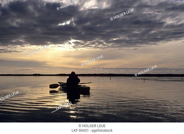 Kayaking on Okarito Lagoon at Sunset, Okarito, West Coast, South Island, New Zealand