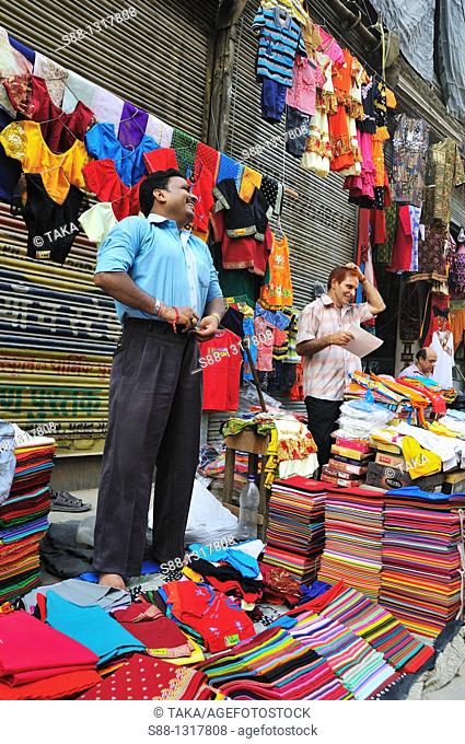 Selling clothe on Pahargaj street, Delhi India