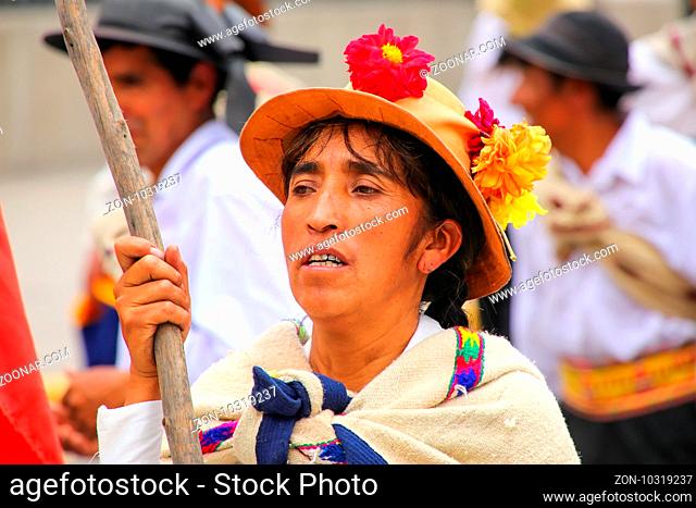 Portrait of a woman dancing during Festival of the Virgin de la Candelaria in Lima, Peru. The core of the festival is dancing and music performed by different...