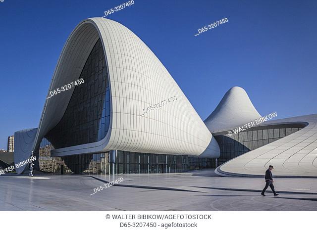 Azerbaijan, Baku, Heydar Aliyev Cultural Center, building designed by Zaha Hadid, exterior with visitors, NR
