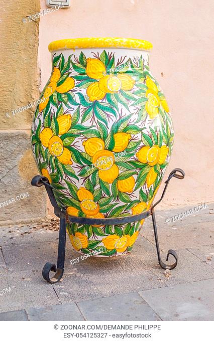 Ceramic jar decorated with lemons on a foot in the city of Santo Stefano di Camastra in northern Sicily