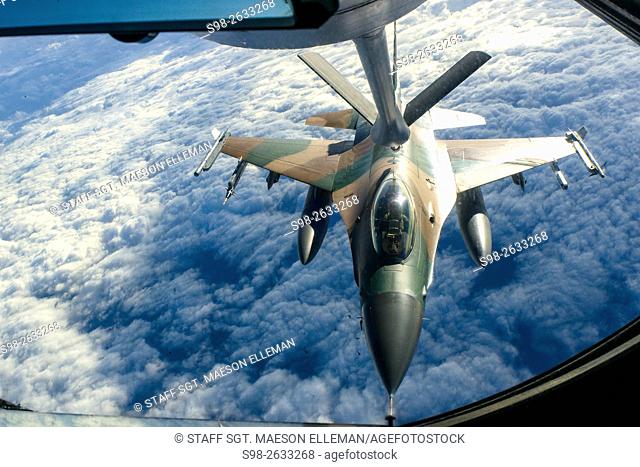 An Air Force F-16 Fighting Falcon aircraft refuels from a KC-135 Stratotanker during Forceful Tiger near Okinawa, Japan, Jan. 28, 2016