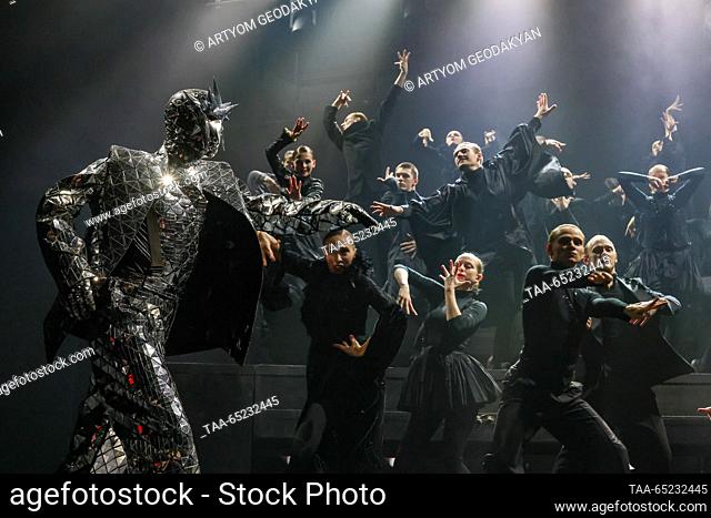 RUSSIA, MOSCOW - NOVEMBER 26, 2023: Actor Alexander Limin as the Mirror Man (L front) performs during a preview of the Sun Atom show at Oleg Tabakov Theatre