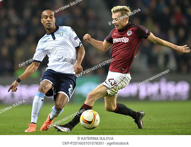 Abdoulay Konko of Lazio, left, and Ladislav Krejci of Sparta fight for the ball during the European Football League group of sixteen opening match AC Sparta...