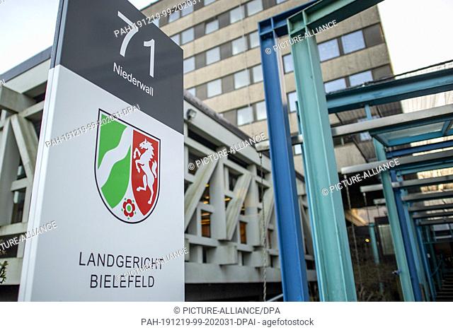 19 December 2019, North Rhine-Westphalia, Bielefeld: Bielefeld Regional Court. Two men (31 and 33 years of age) from Herford and Lüdinghausen stand before the...