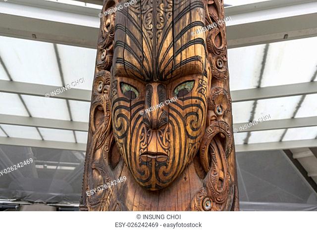 maori wooden carved statue in whakarewarewa village tour in rotorua, new zealand