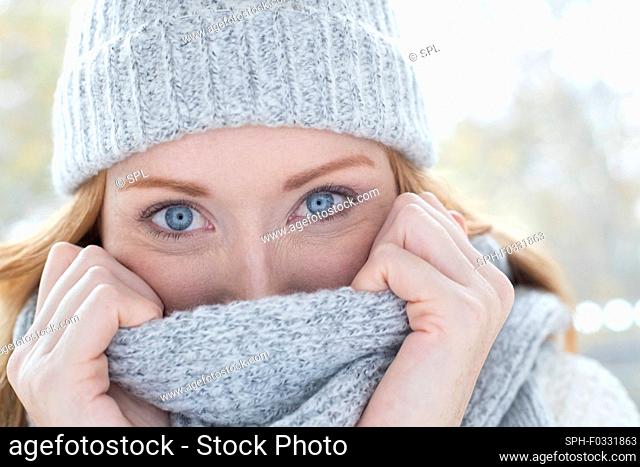 Woman in hat and scarf