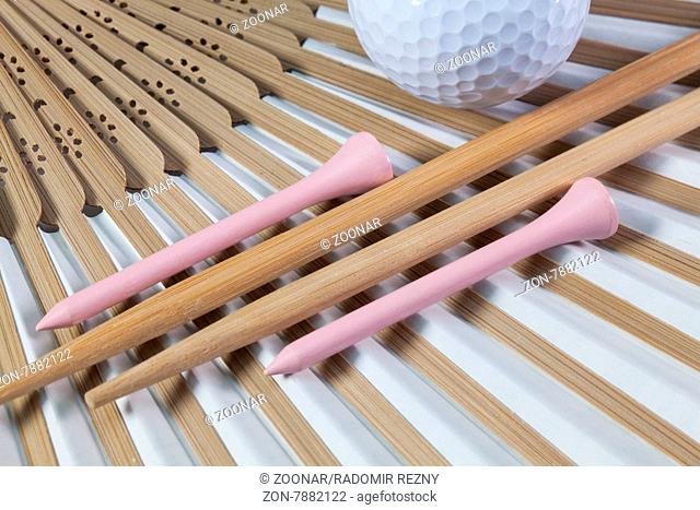Typical Japanese hand fan made of bamboo, chopsticks and golf equipments