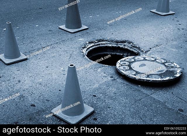 open manhole and repair of roads