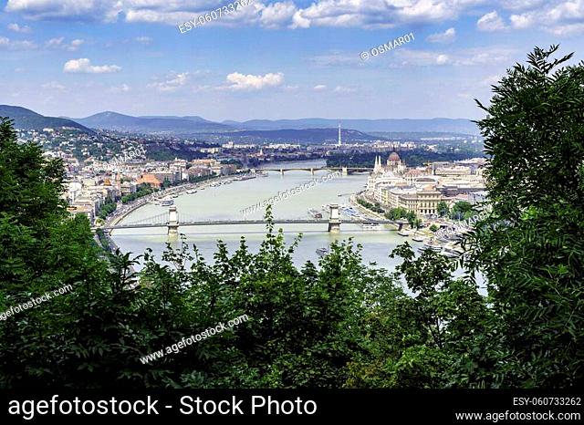 Panorama of Budapest over the Danube river. The bridges destroyed in World War II touch the two parts of the city Buda and Pest