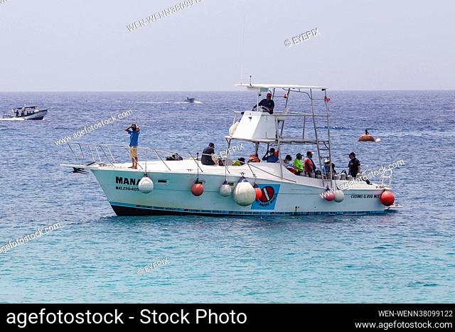 Tourists are spotted enjoying walks and boat trips during their holidays in Cozumel island amid the fourth upturn of Covid-19 disease on August 25