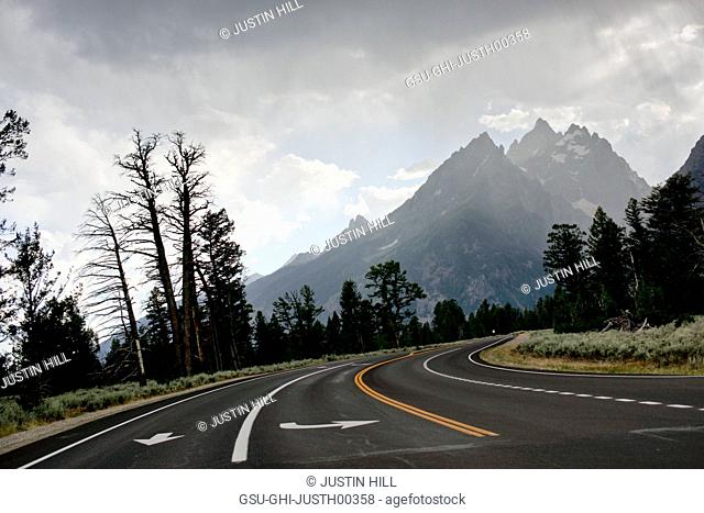 Road Leading to Teton Mountain Range, Grand Teton National Park, Wyoming, USA