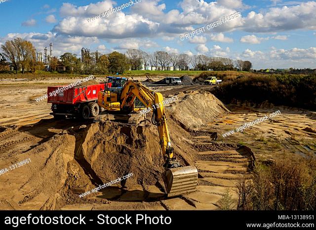 Oberhausen, Ruhr area, North Rhine-Westphalia, Germany - excavators during earthworks as part of the Emscher conversion, new construction of the Emscher AKE...