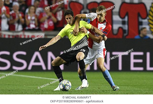 From left MARIO RONDON of CFR and TOMAS SOUCEK of Slavia in action during the Football Champions' League 4th qualifying round return match: Slavia Prague vs...