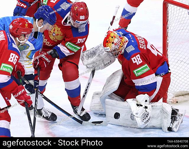 RUSSIA, ST PETERSBURG - DECEMBER 17, 2023: Russia 25's goaltender Nikita Serebryakov (R) in action in their 2023 Channel One Cup ice hockey match against...