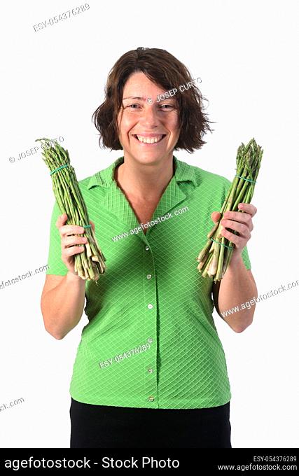 portrait of a woman with asparagus on white background