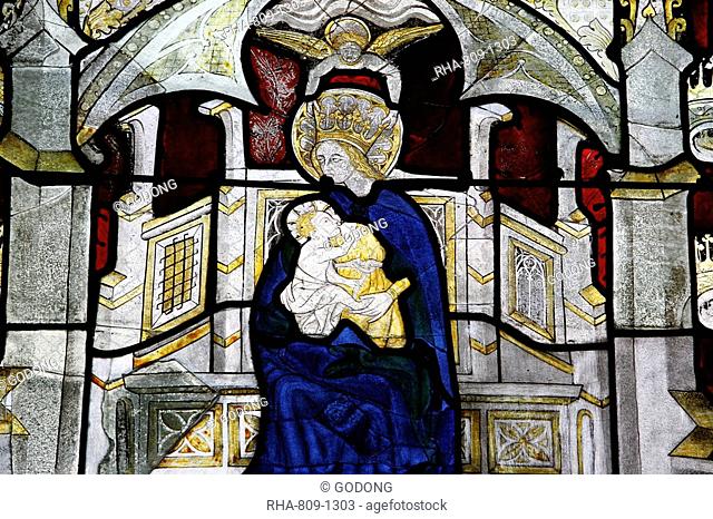 Stained glass window of the Virgin and Child at Collegiale Notre-Dame des Marais, Villefranche-sur-Saone, Rhones-Alpes, France, Europe