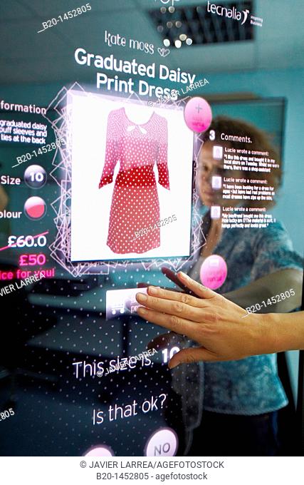 Interactive mirror that allows the person standing in front of it to see a simulated view of how the clothes they wish to buy would look when they wear them...