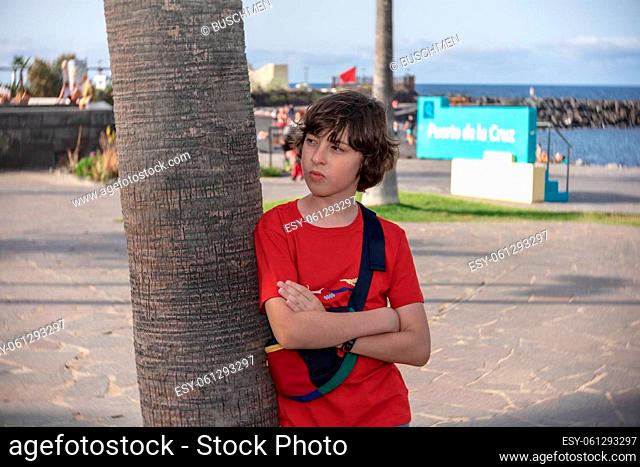 Portrait of a teenager on the promenade of Puerto de la Cruz. Tenerife. Canary Islands. Spain