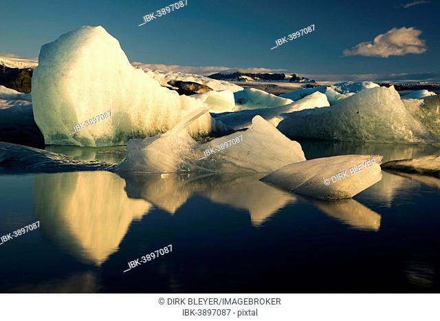 Icebergs reflected in Jökulsárlón Glacier Lagoon, Vatnajökull Glacier, Austurland, East Iceland, Iceland