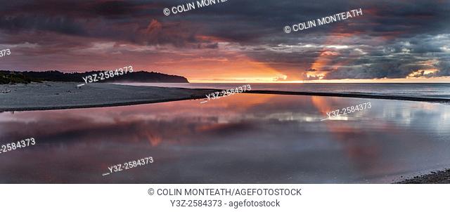 Sunset refection, Three Mile Beach and lagoon, panorama, beyond Okarito, West Coast