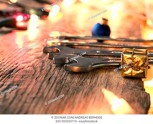 Christmas background with tools on a rustic wooden table