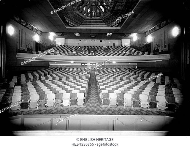 Auditorium at the Odeon, Great North Road, Barnet, London, c1935. Viewed frorm the stage looking towards the back doors. Designed in the Art Deco style with an...