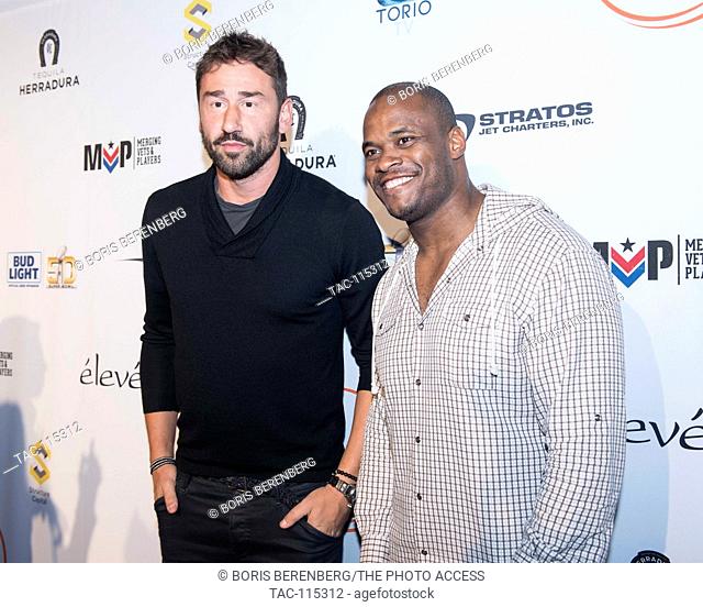 Melvin Fowler and Marko Jaric pose for a photo at the Glazer Palooza + Suits & Sneakers Red Carpet event on February 3rd at Pier 27 in San Francisco