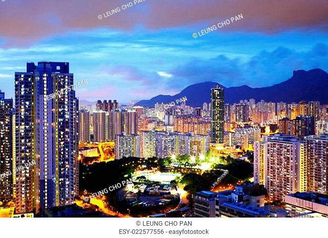 Kowloon side in Hong Kong at night with lion rock