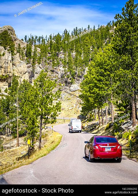 Cars on the Needles Highway in Custer State Park in the Black Hills of South Dakota USA